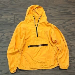 M orange windbreaker